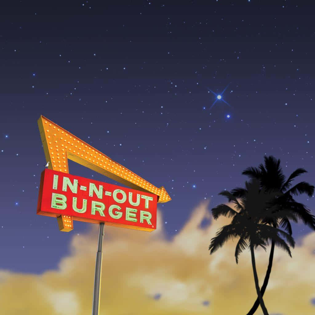 A Neon Sign With Palm Trees And A Starry Sky Background