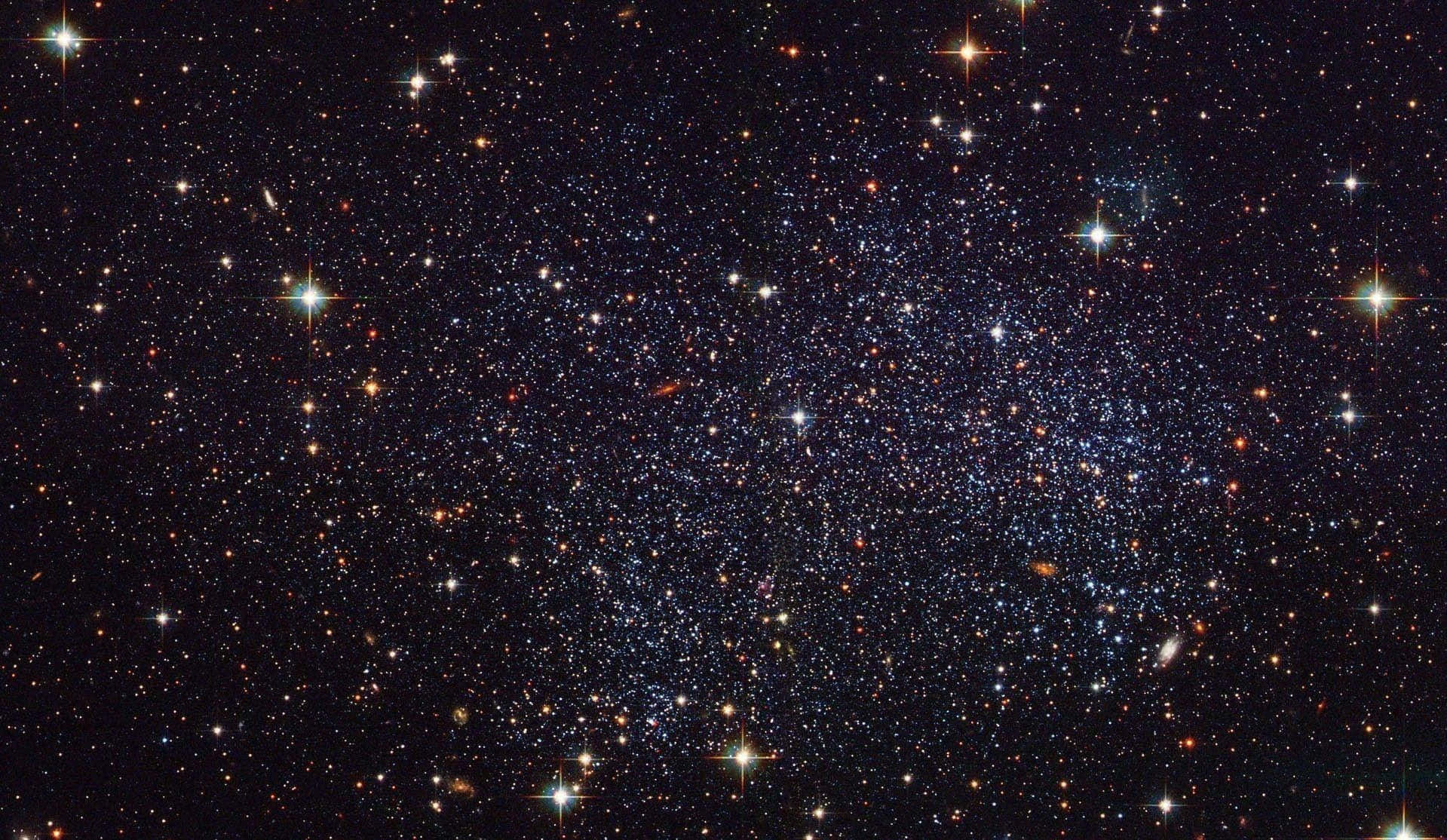 A Night Sky Of Stars Fills The View, Creating A Peaceful And Aesthetically Pleasing Scene.