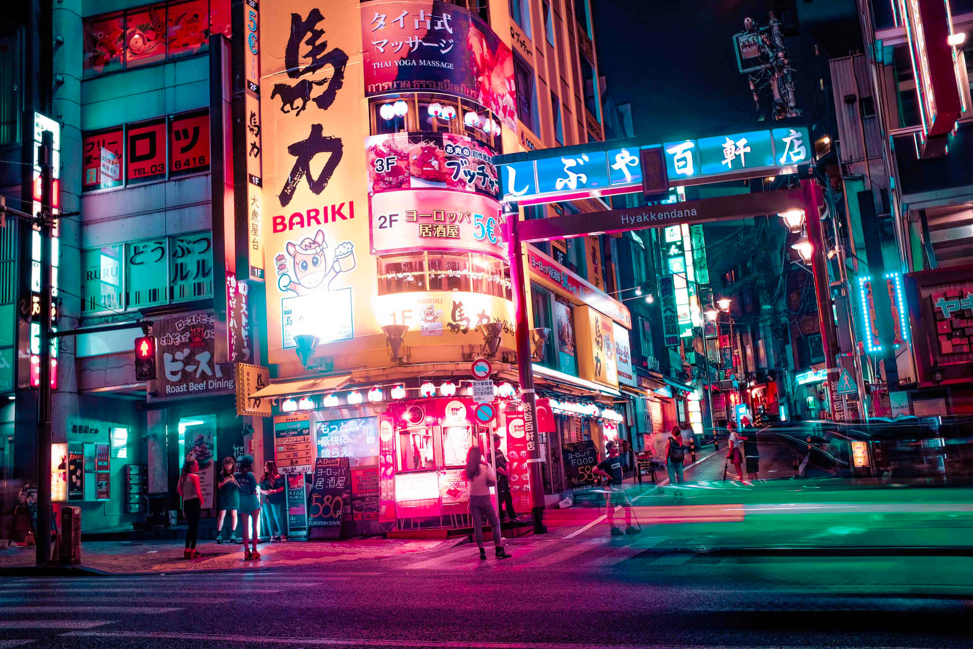 A Nightscape Of Tokyo Illuminated With Japanese Neon Signs Background