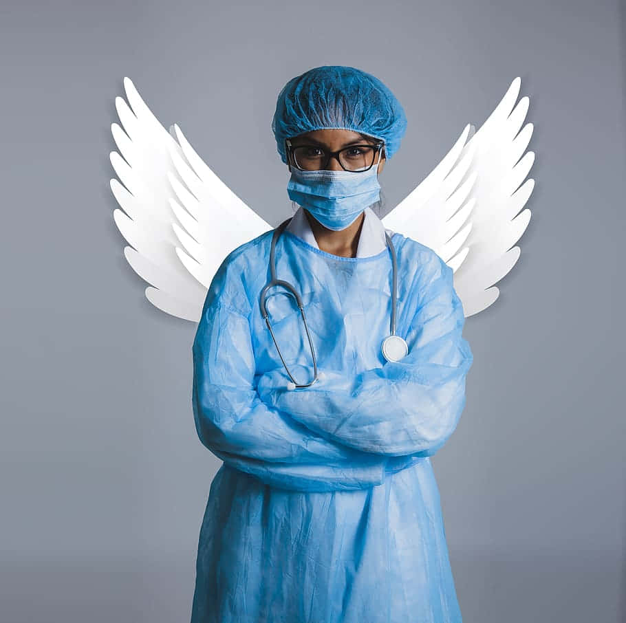 A Nurse In Blue Scrubs With Wings Background