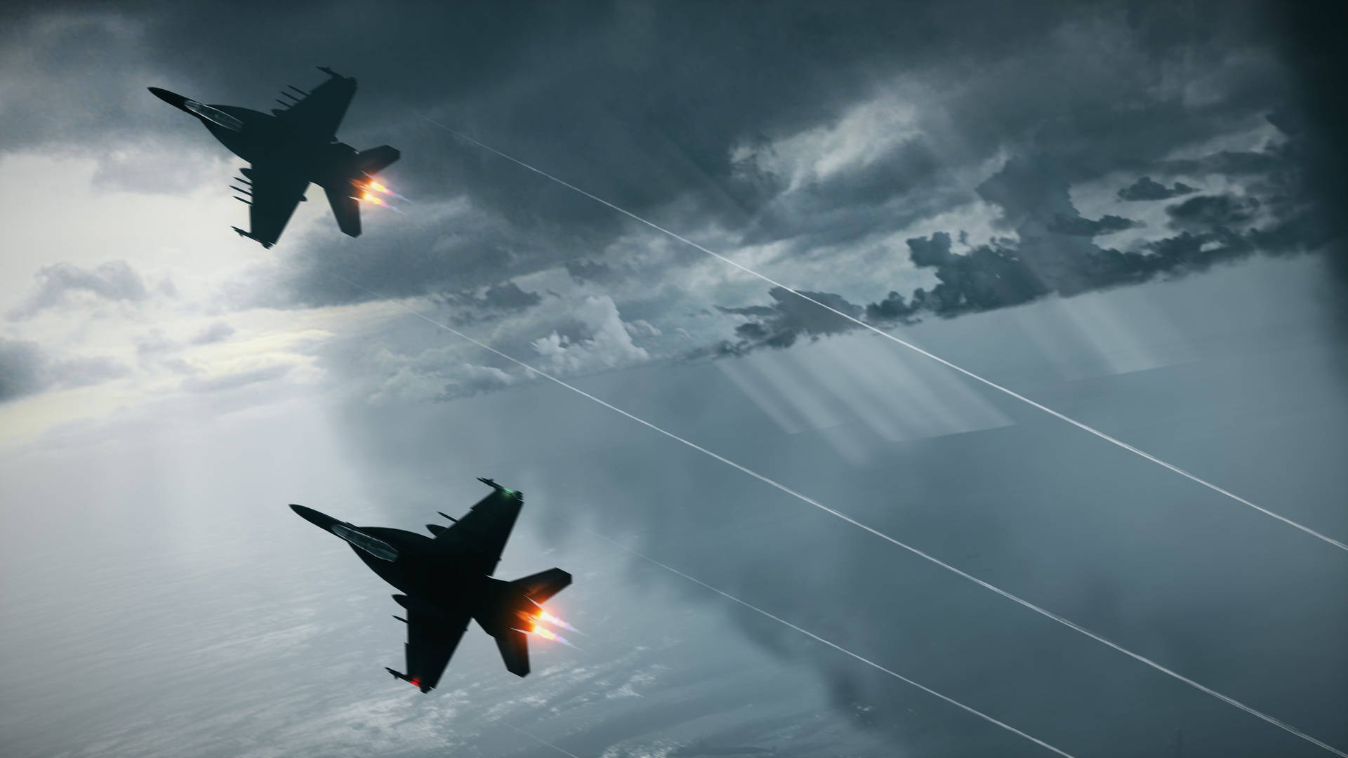 A Pair Of Fighter Jets Flying In The Sky