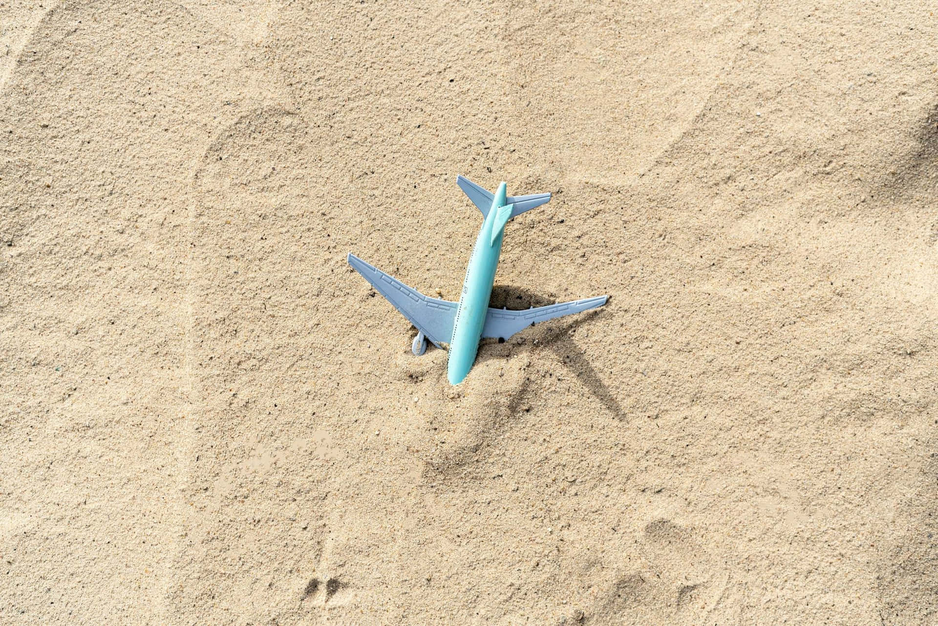 A Passenger Airplane Soars The Skies Background