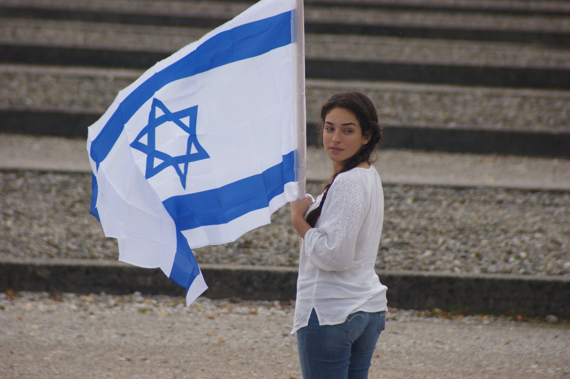 A Patriotic Display With An Israeli Lady And The Israel Flag. Background