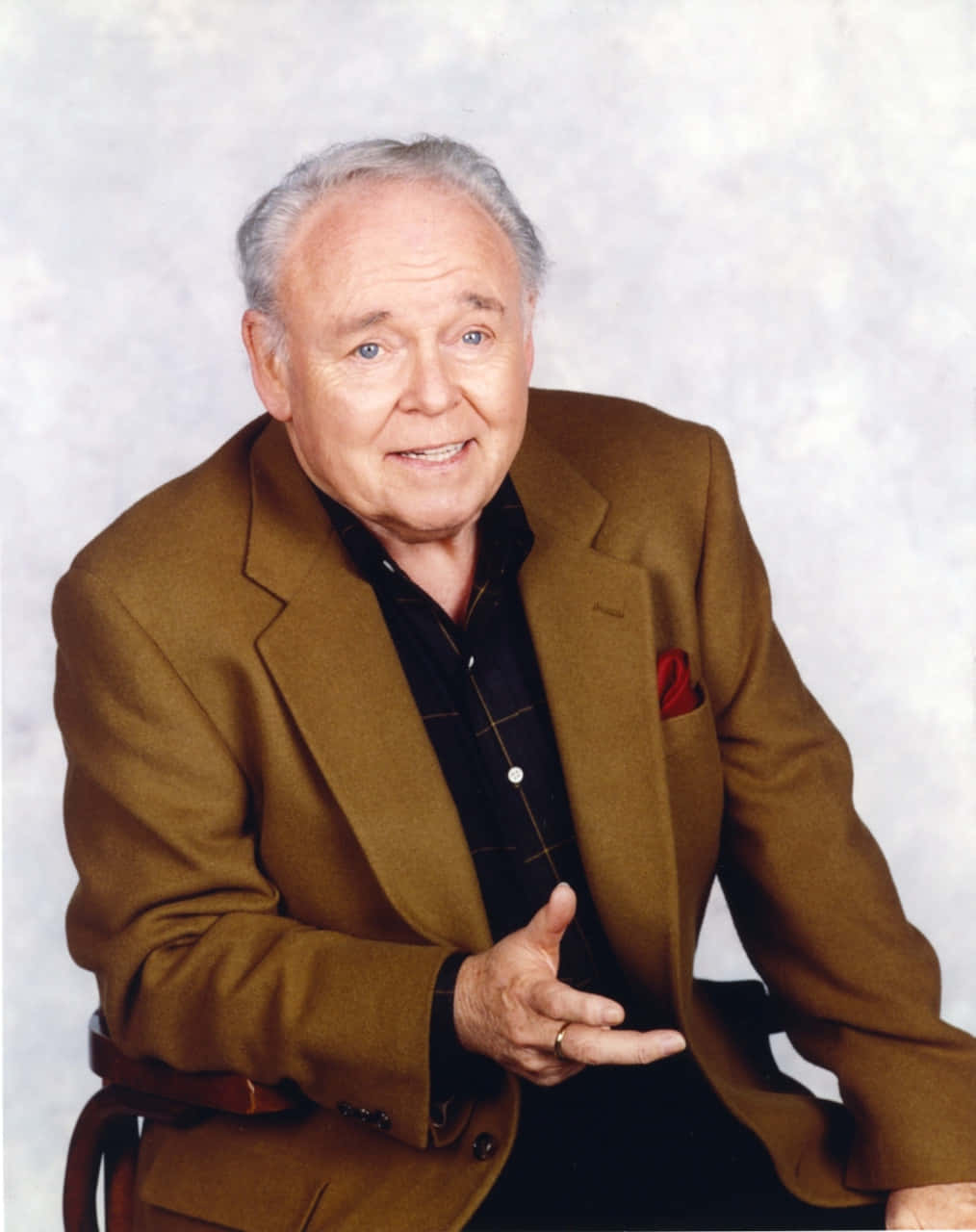 A Pensive Carroll O'connor In Classic Black And White Background