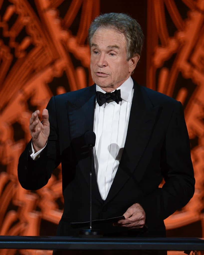 A Pensive-looking Warren Beatty In A Classic Portrait Background