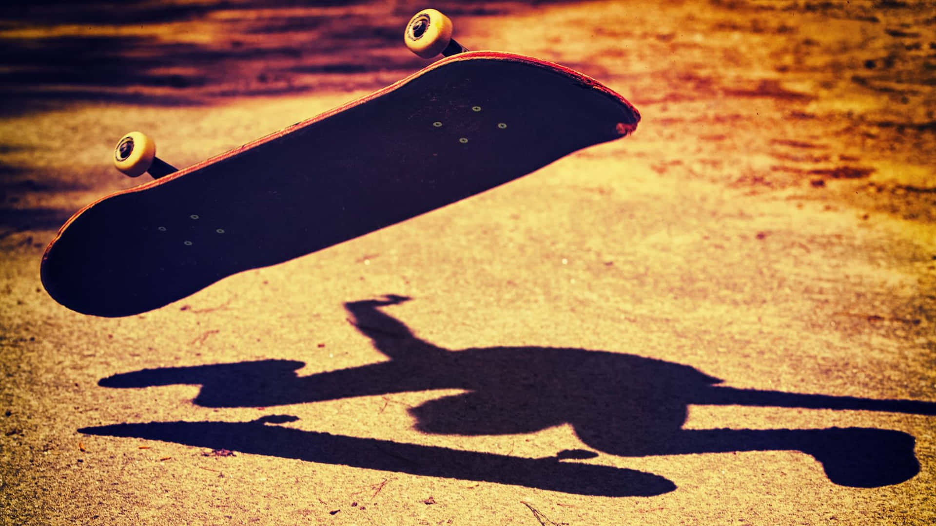 A Person Doing A Skateboard Trick Background