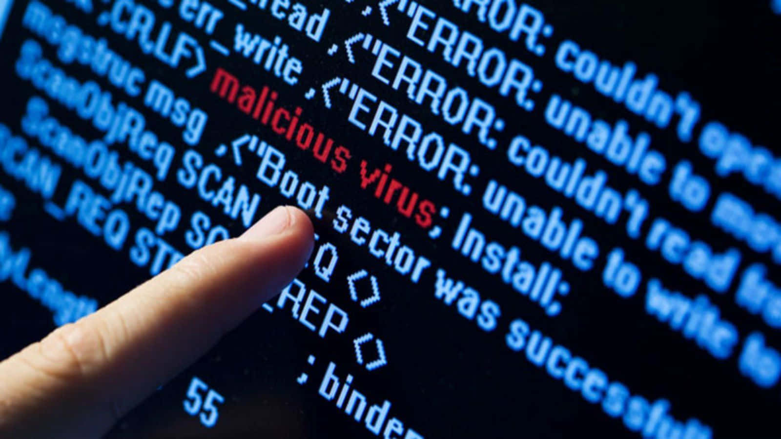 A Person Is Pointing At A Computer Screen With A Virus On It Background