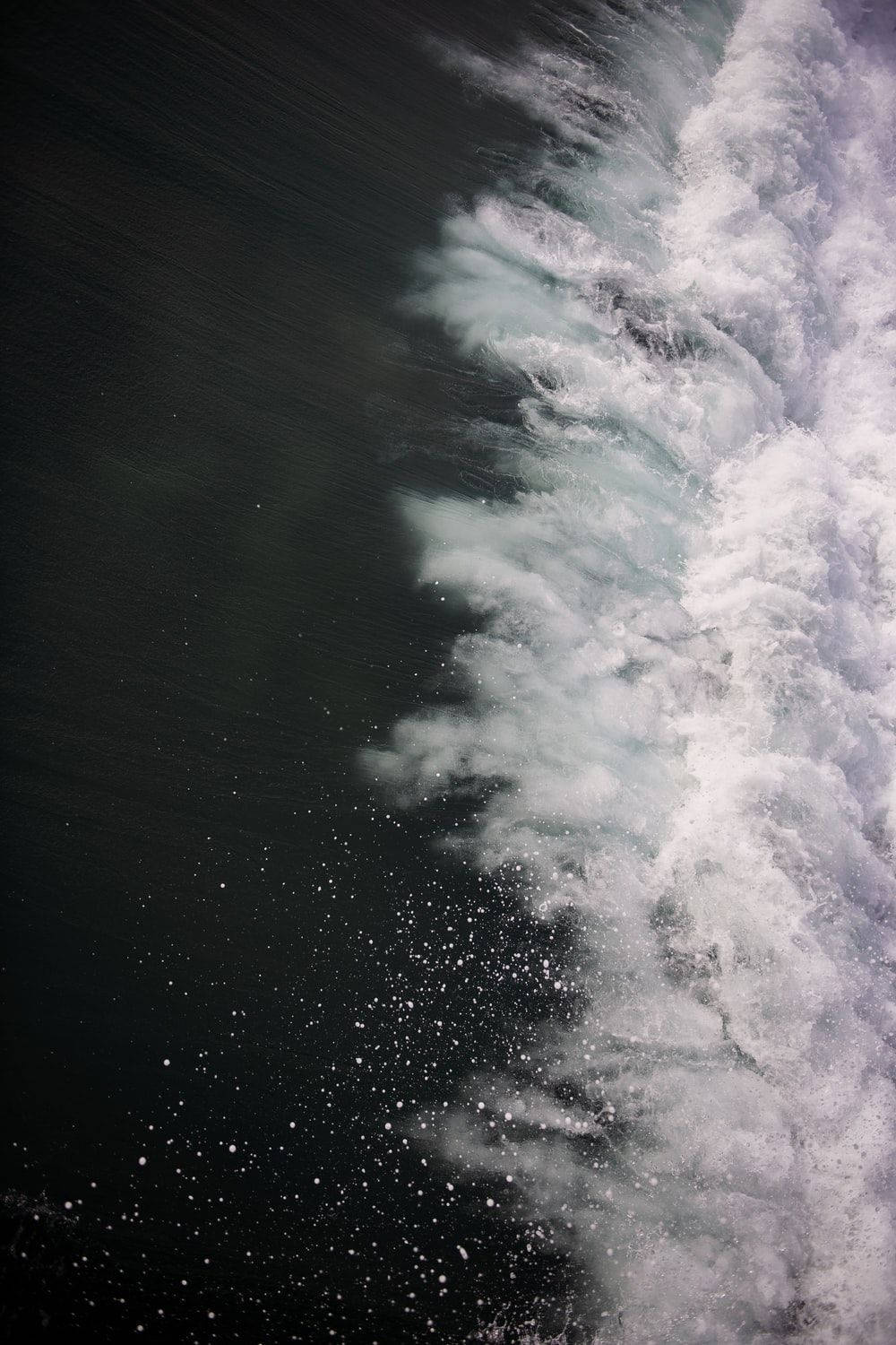 A Person Is Riding A Surfboard Background