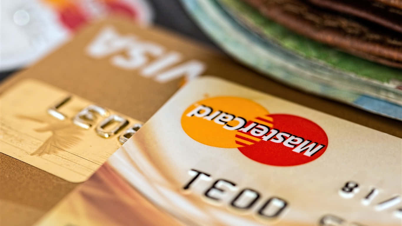 A Person Making A Payment With A Mastercard. Background