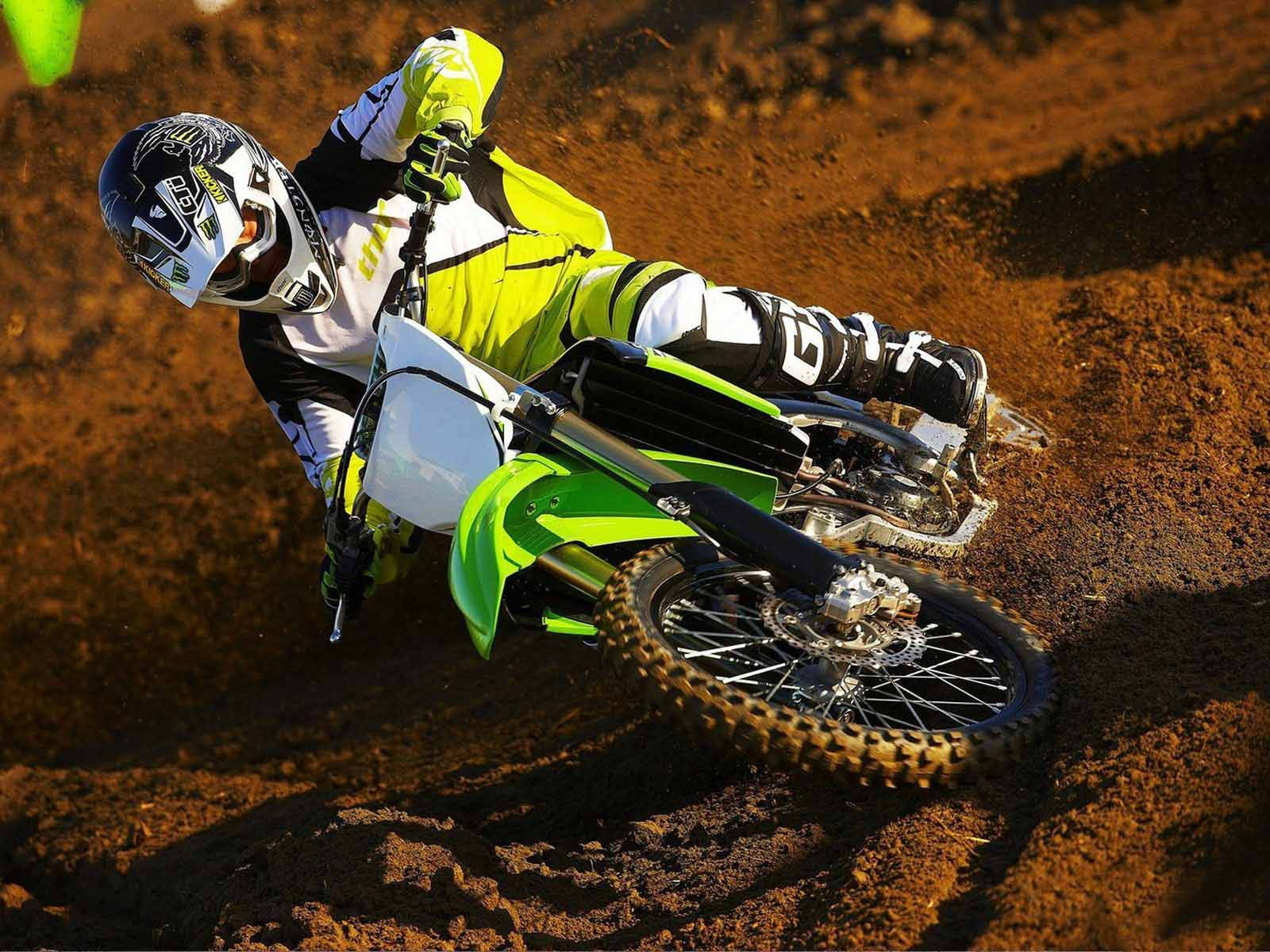 A Person Riding A Dirt Bike Background