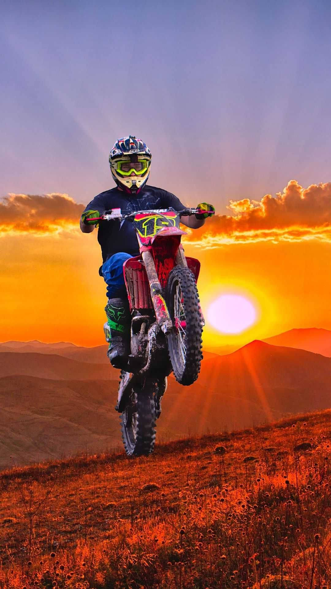 A Person Riding A Dirt Bike Background