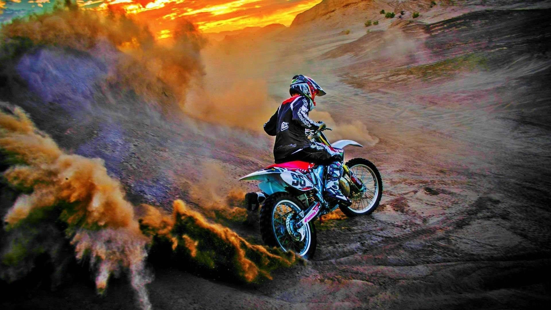 A Person Riding A Dirt Bike Background