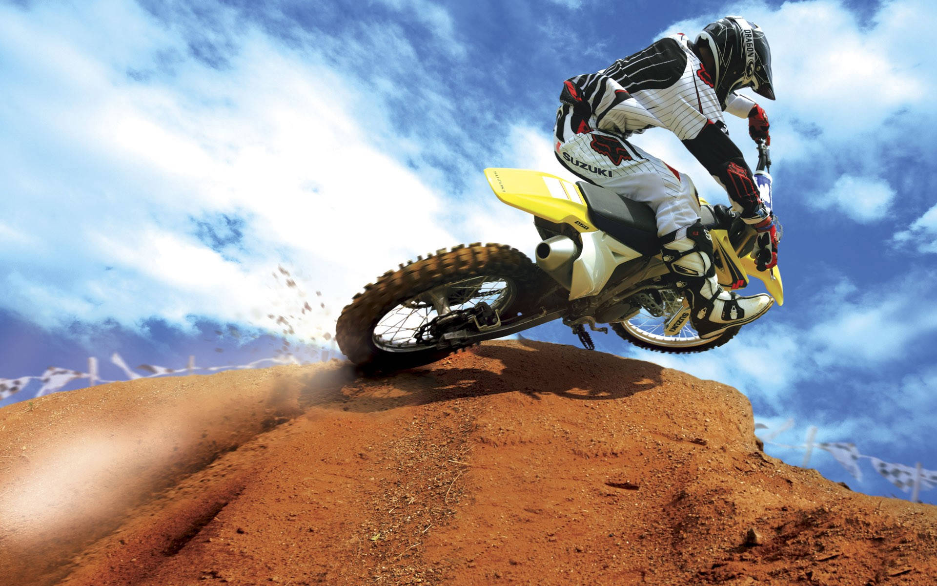 A Person Riding A Dirt Bike Background