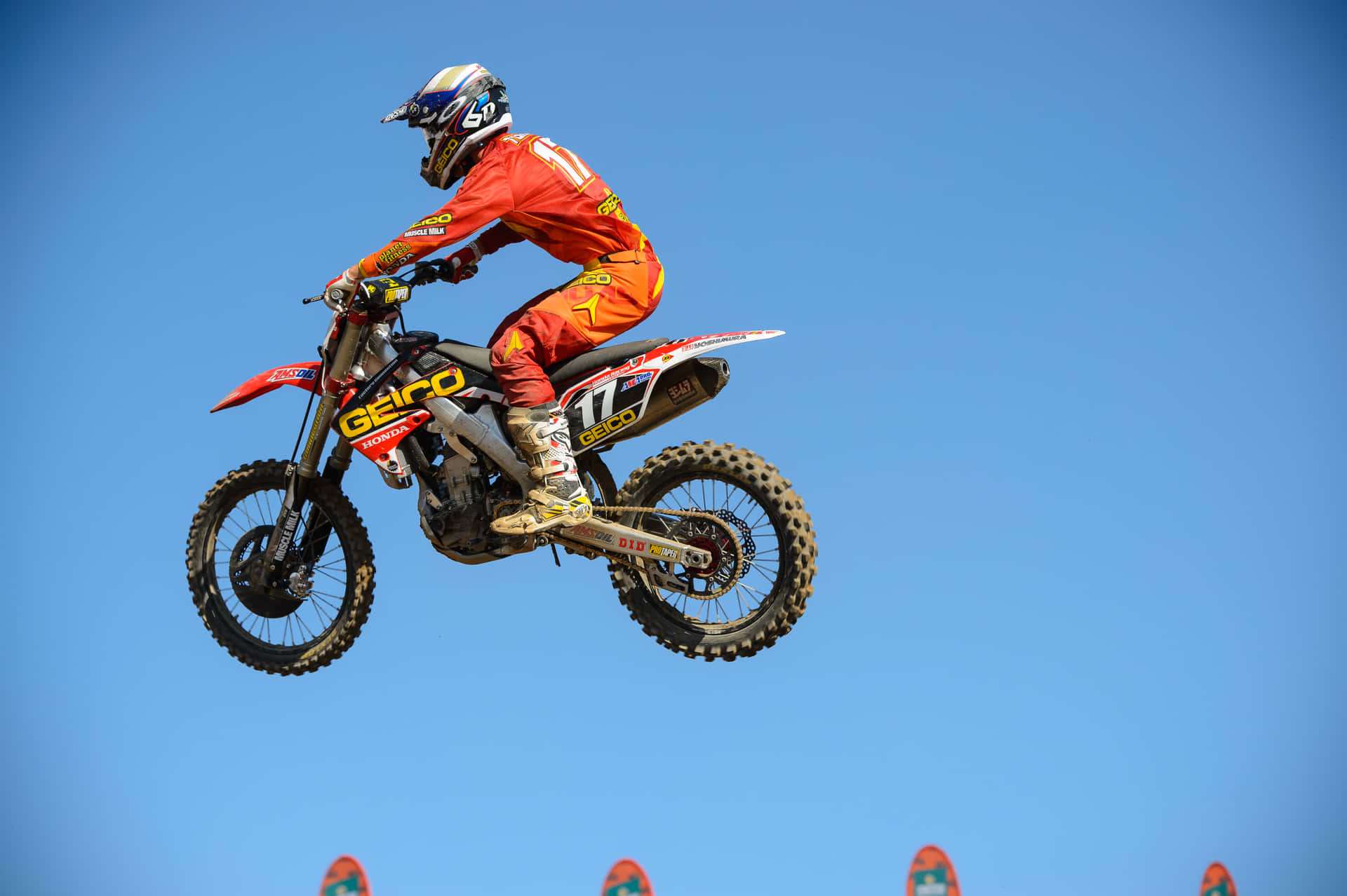 A Person Riding A Dirt Bike Background