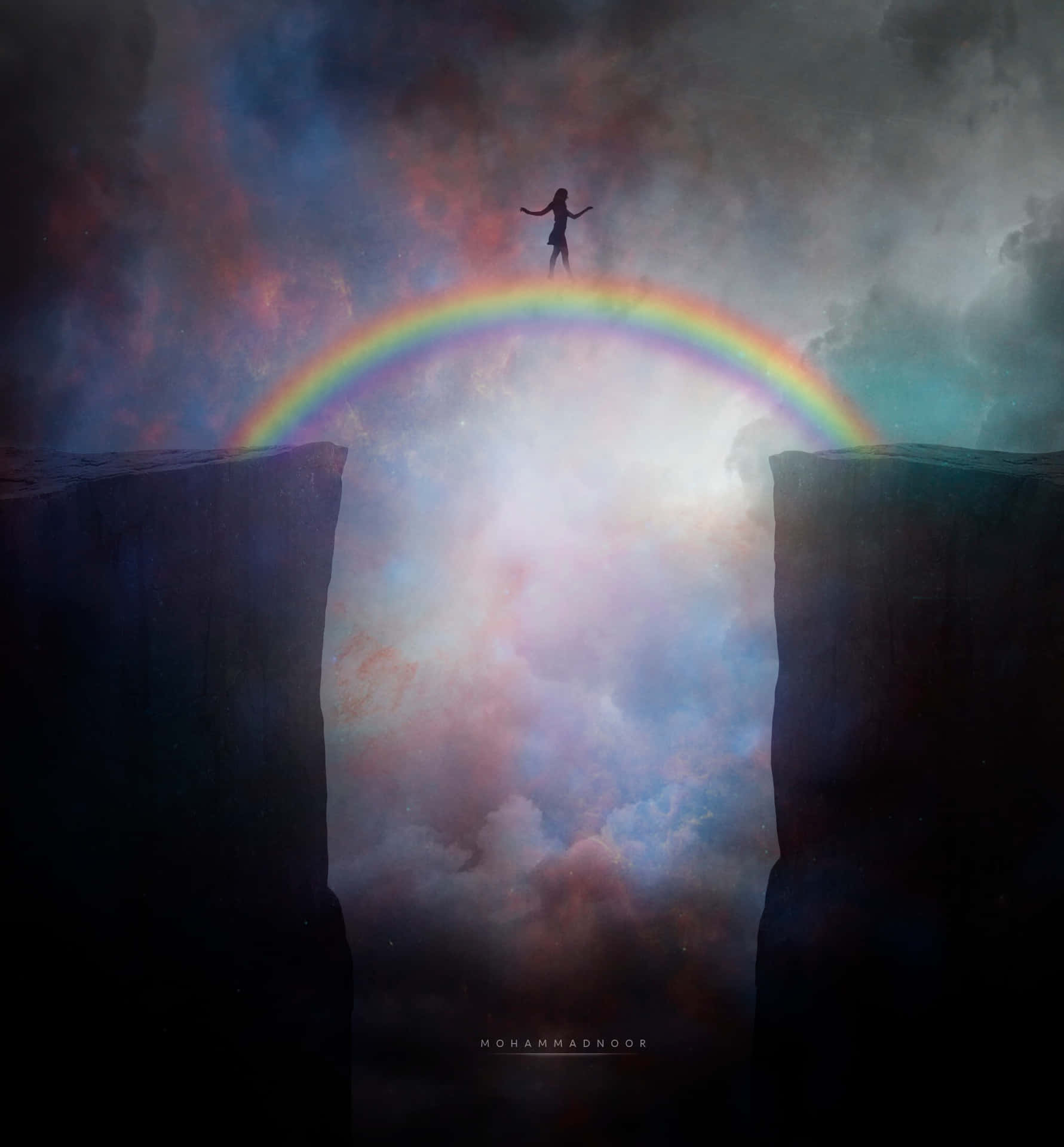 A Person Standing On A Cliff With A Rainbow In The Sky Background