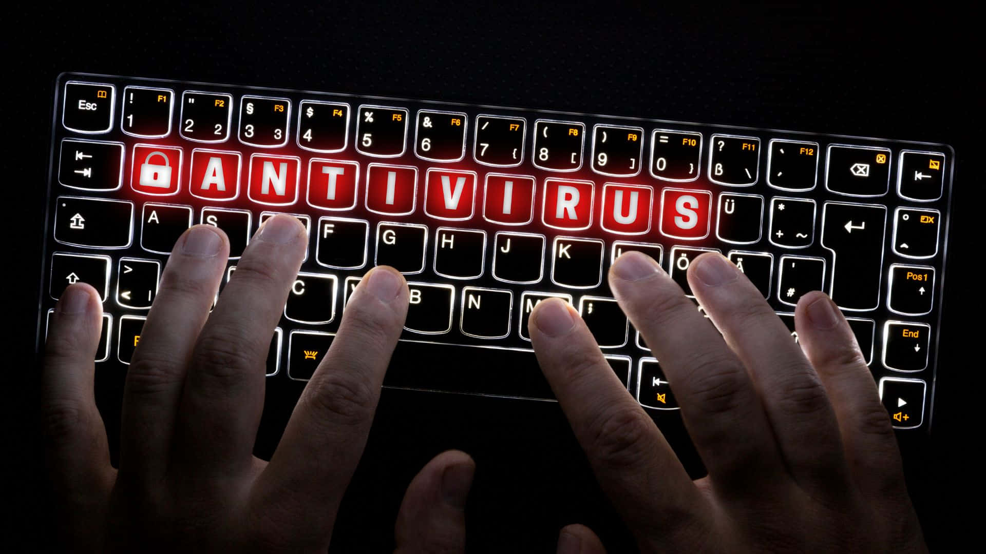 A Person Typing On A Keyboard With The Word Virus