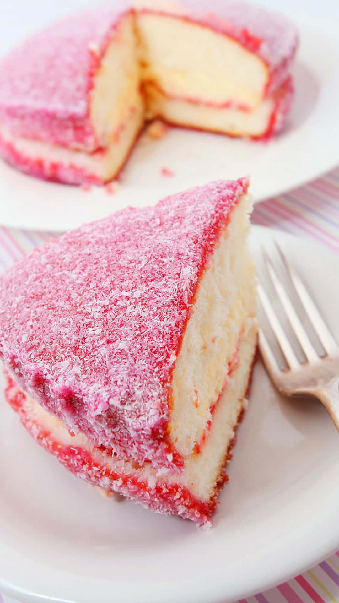 A Piece Of Cake Is On A Plate Background