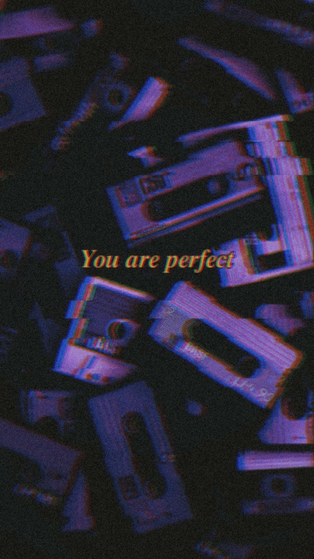 A Pile Of Cassette Tapes With The Words You Are Perfect