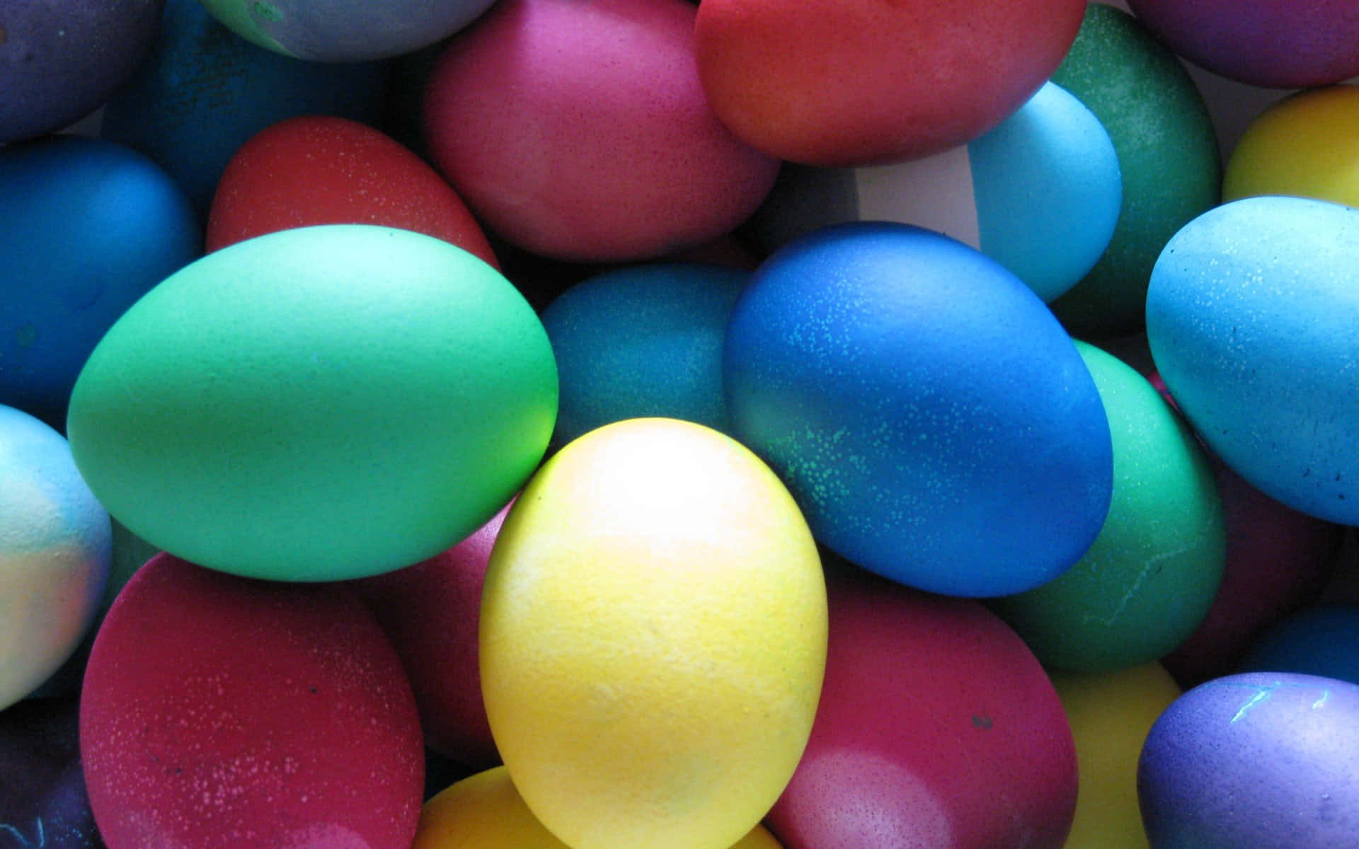 A Pile Of Colorful Easter Eggs Background
