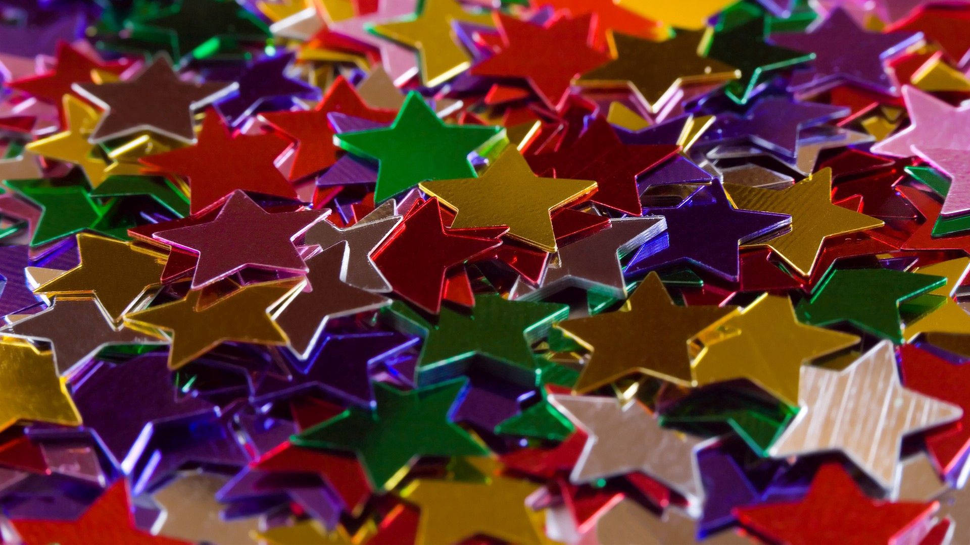 A Pile Of Colorful Star Confetti