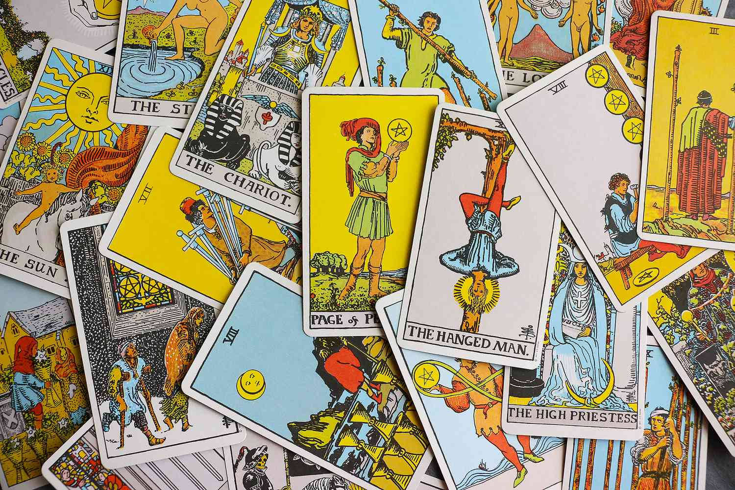 A Pile Of Tarot Cards With Many Different Images Background