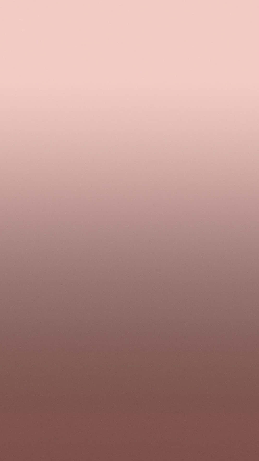 A Pink And Brown Gradient Wallpaper Background