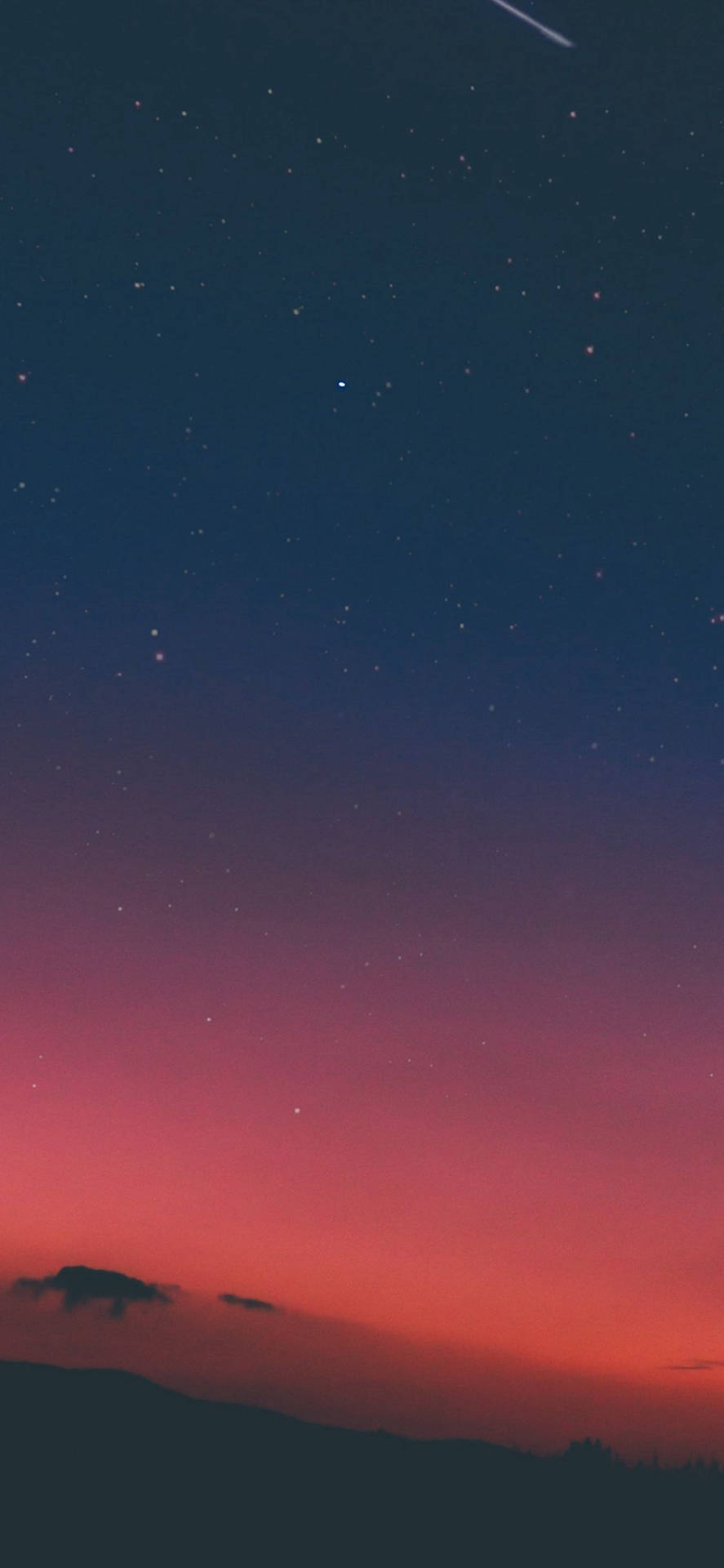 A Pink And Purple Sky With A Comet In The Sky Background