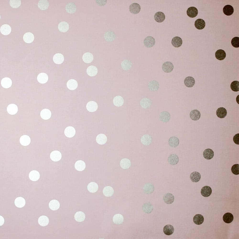 A Pink And Silver Polka Dot Fabric Background