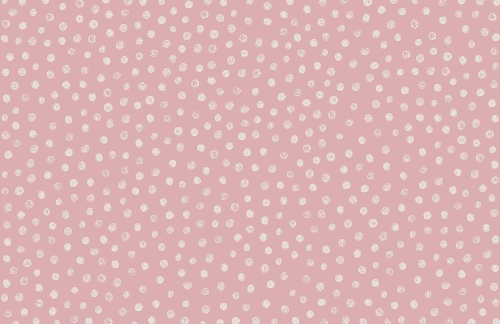 A Pink And White Polka Dot Wallpaper Background