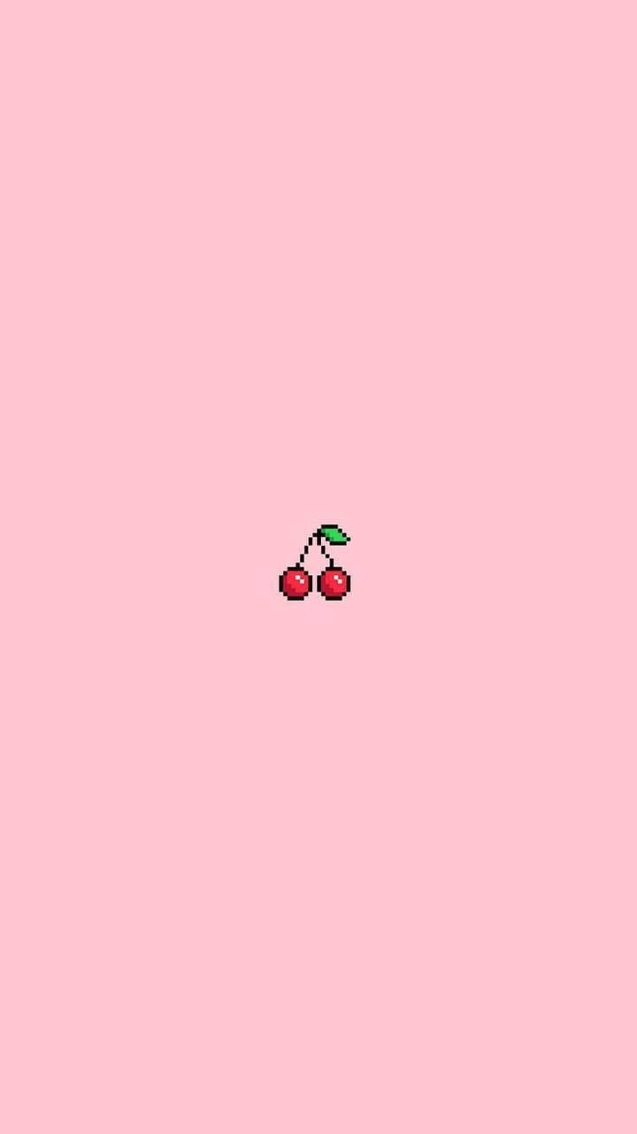 A Pink Background With A Cherry On It Background