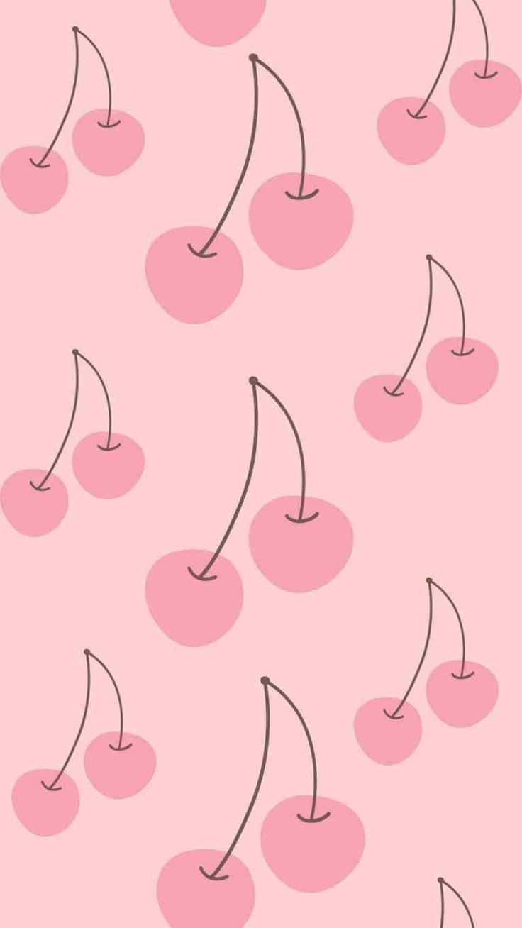 A Pink Background With Cherries On It