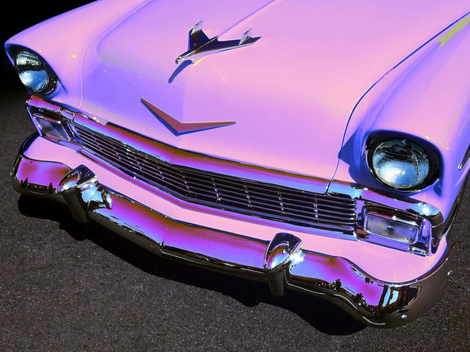 A Pink Car Parked On The Street Background