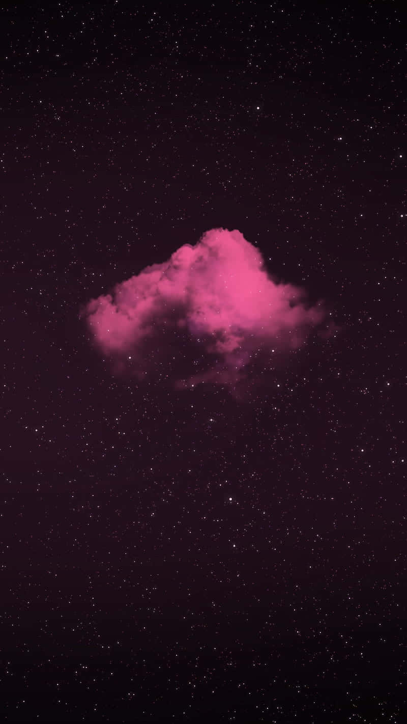 A Pink Cloud In The Sky With Stars