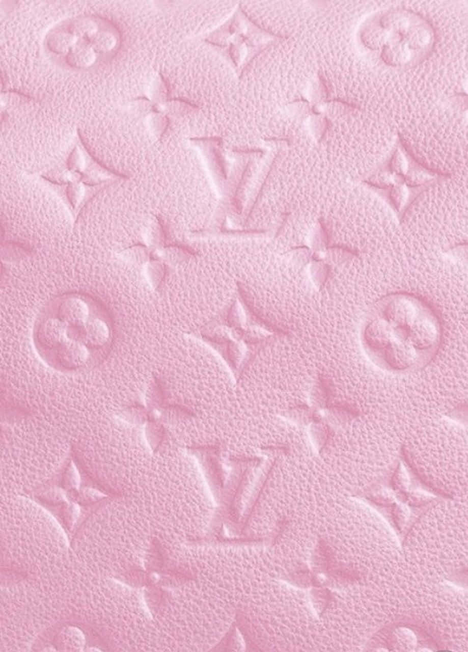 A Pink Louis Vuitton Purse Adding A Pop Of Color To An Outfit. Background