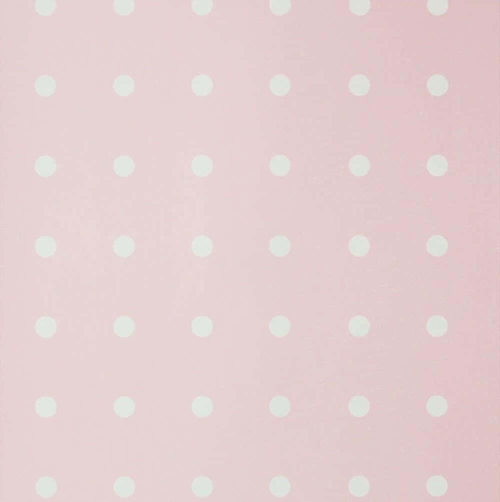 A Pink Polka Dot Wallpaper With White Dots Background