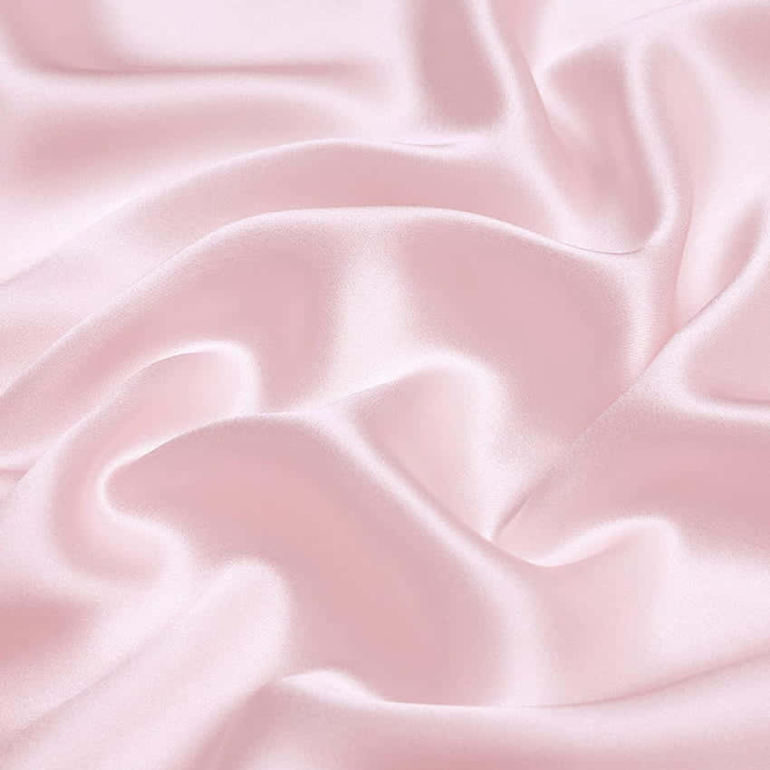 A Pink Satin Fabric With A Smooth Texture Background