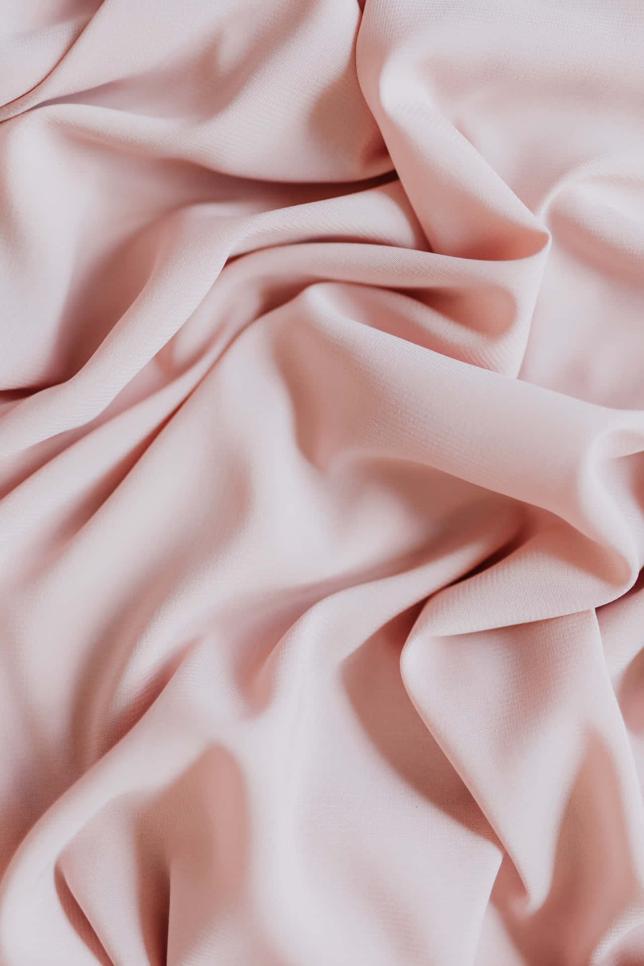 A Pink Silk Fabric With A Smooth Texture Background