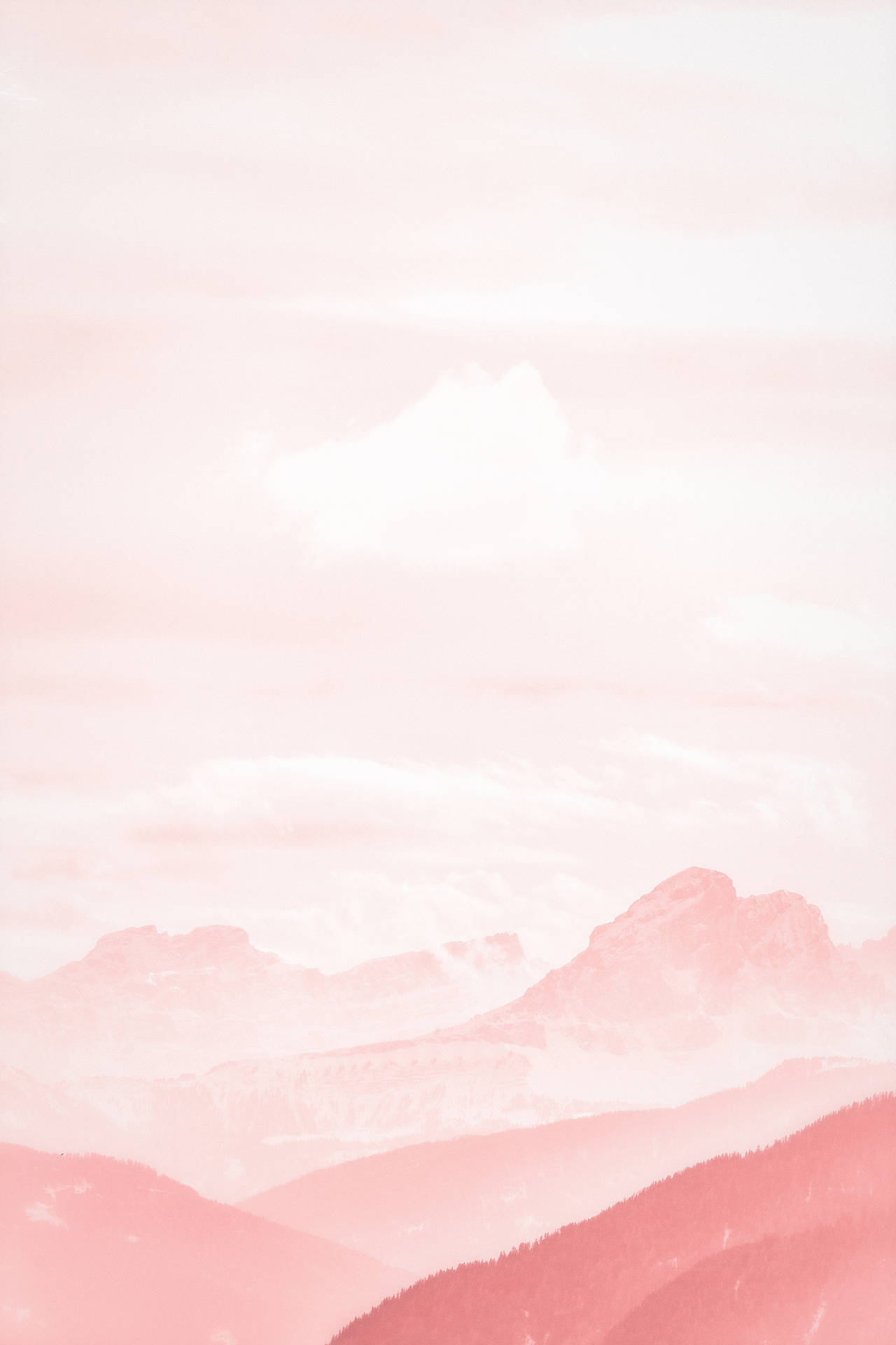 A Pink Sky With Mountains Background