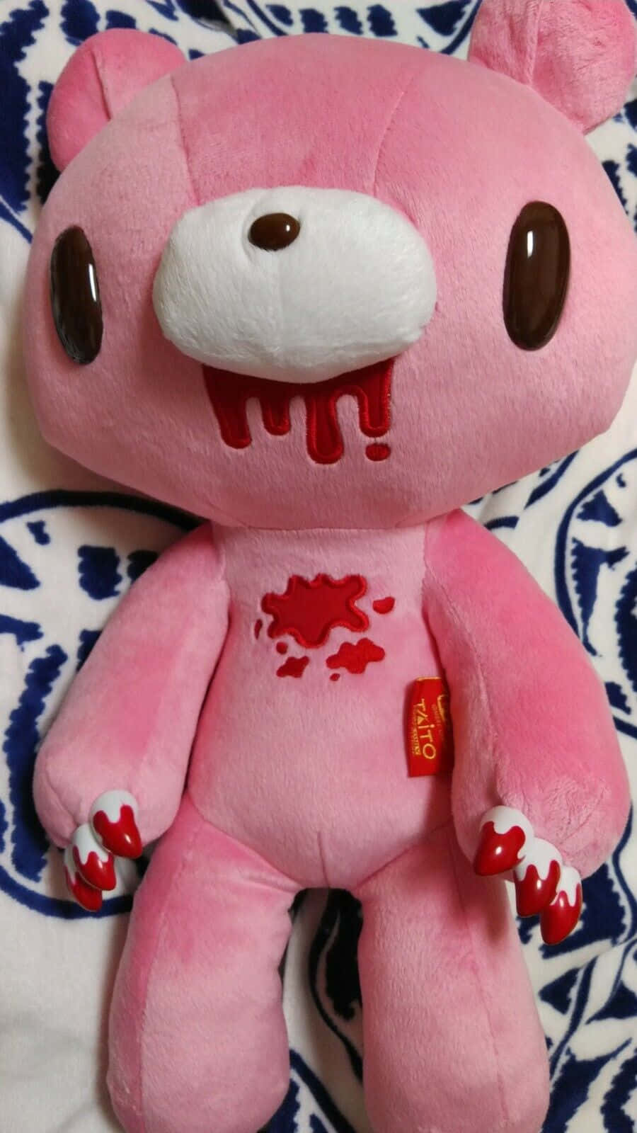 A Pink Stuffed Animal With Blood On It