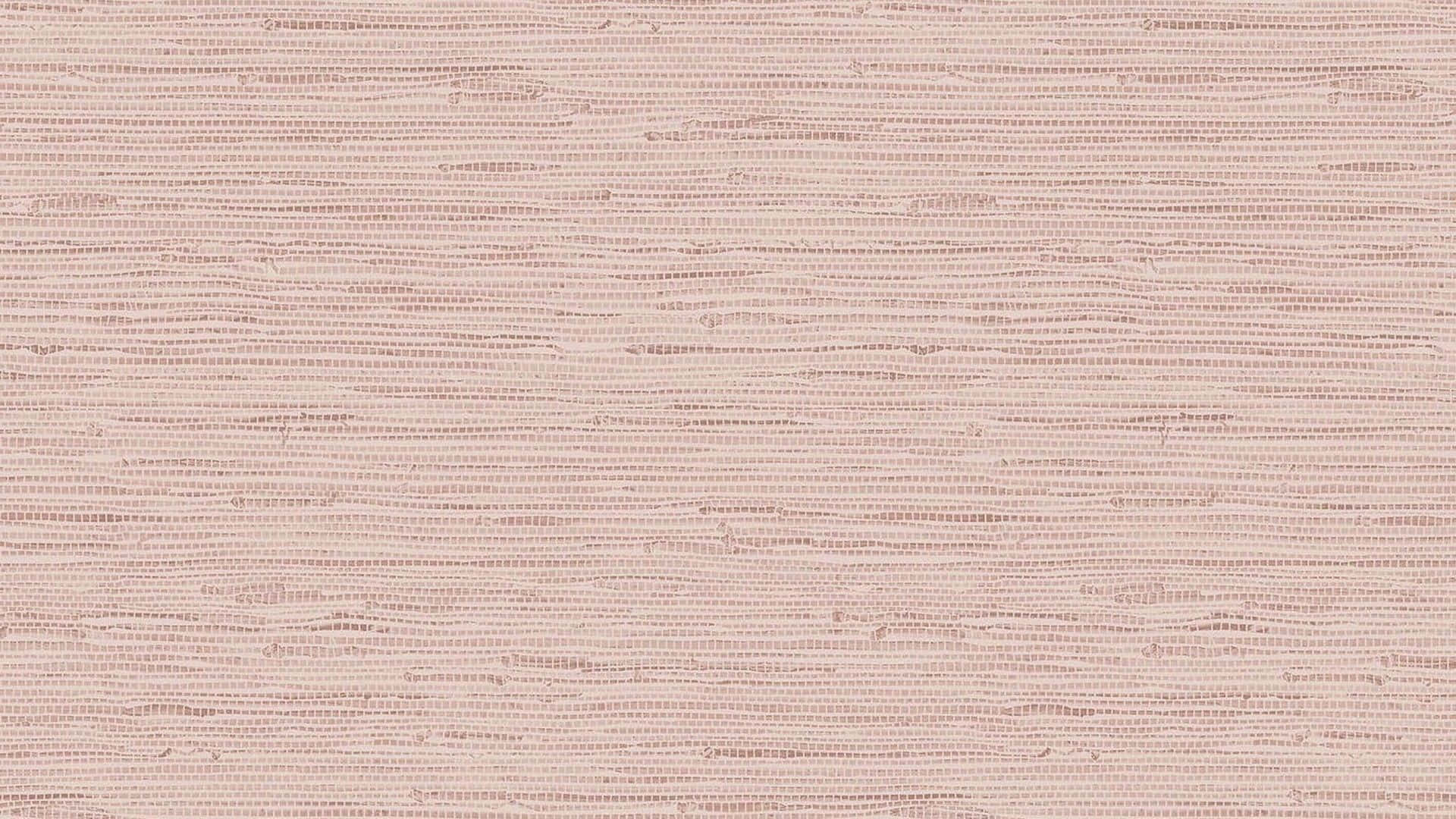 A Pink Wallpaper With A Light Texture