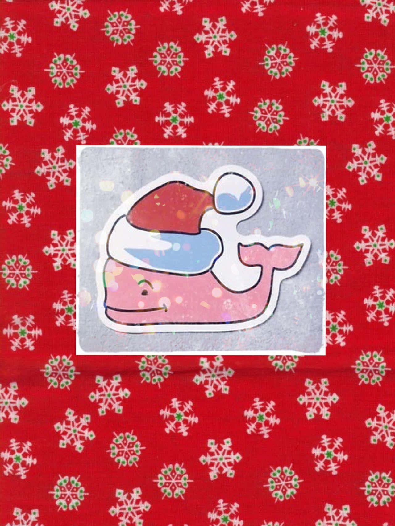 A Pink Whale With A Santa Hat On A Red Background