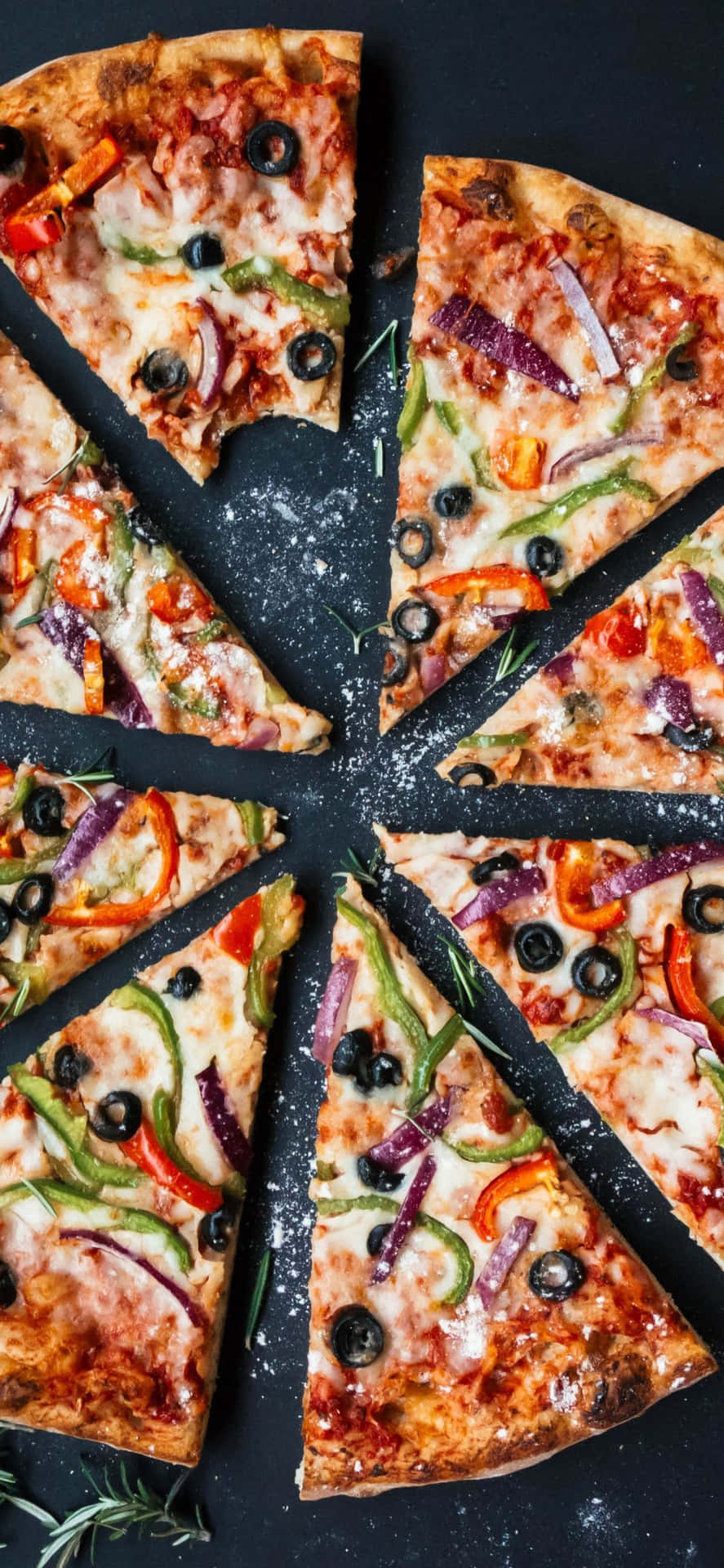 A Pizza With Vegetables And Olives Is Cut Into Slices Background