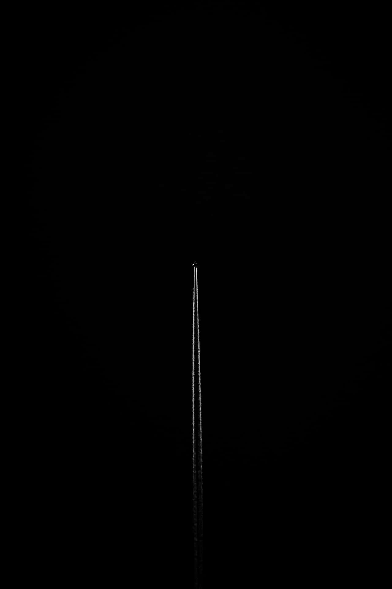 A Plane Flying In The Sky Background