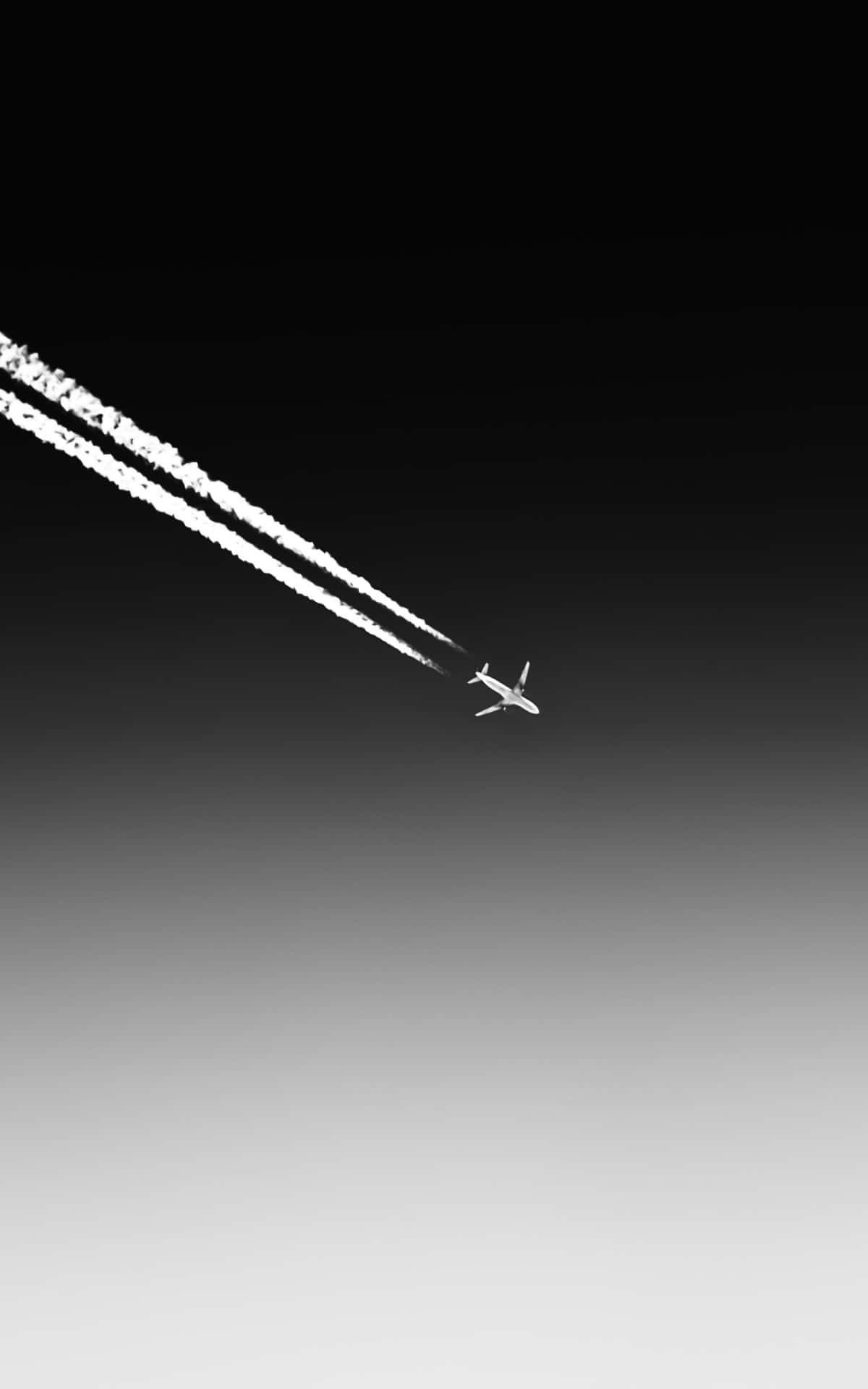 A Plane Flying In The Sky Background