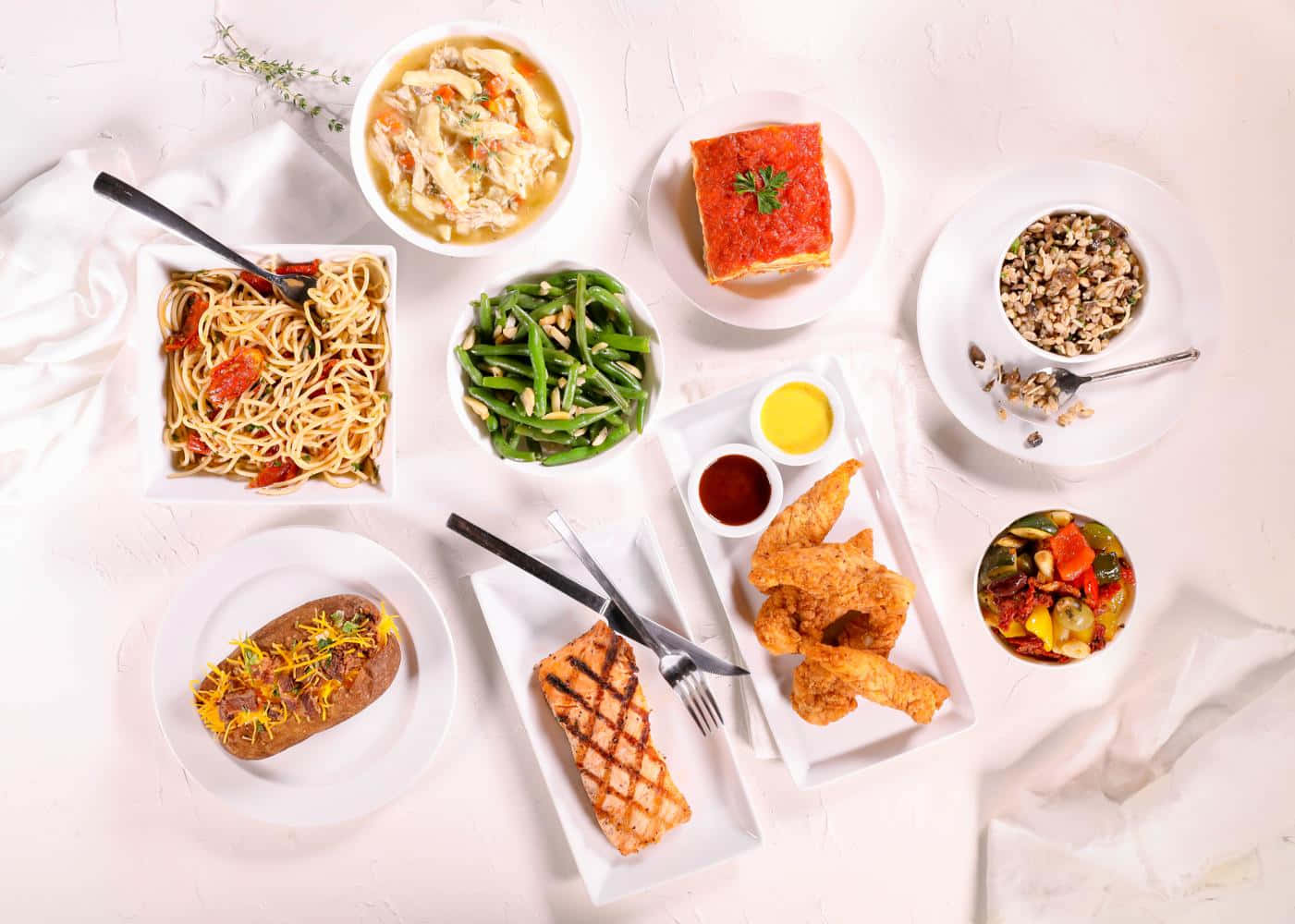 A Plate Of Food With Different Types Of Food Background