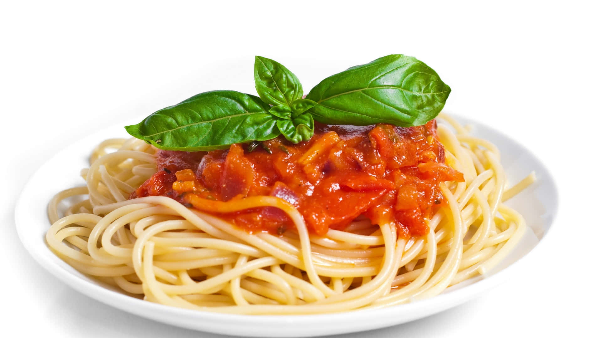 A Plate Of Spaghetti With Tomato Sauce And Basil Background