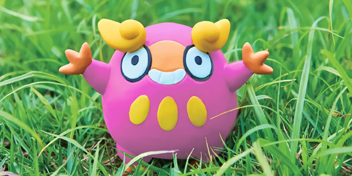 A Playful Darumaka In Its Natural Pokemon Environment. Background