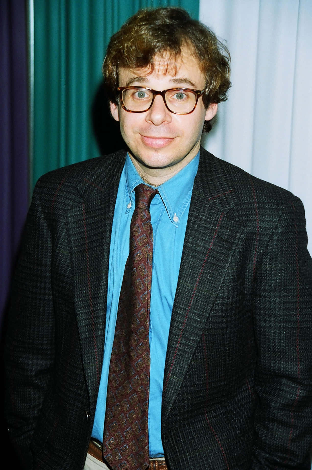 A Portrait Of Rick Moranis, The Popular Actor And Comedian Background