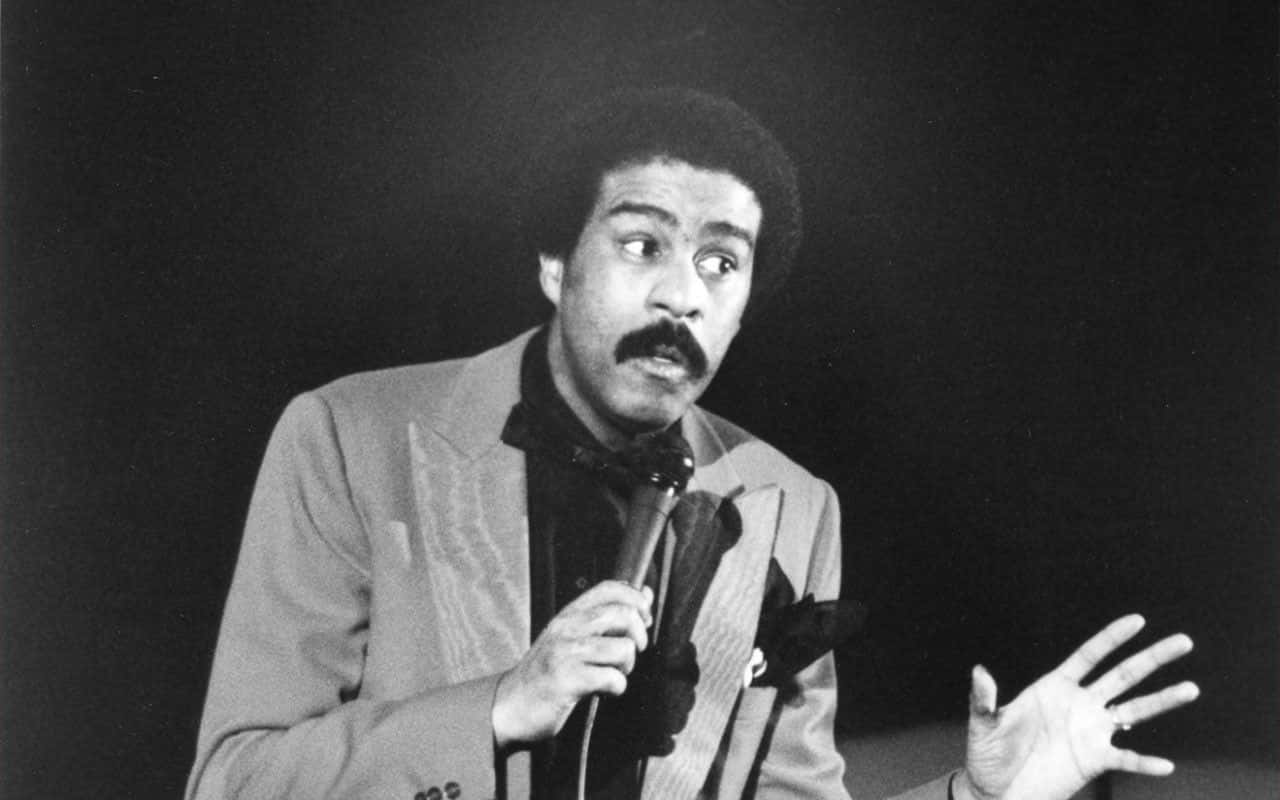 A Portrait Of The Iconic Comedian Richard Pryor Background