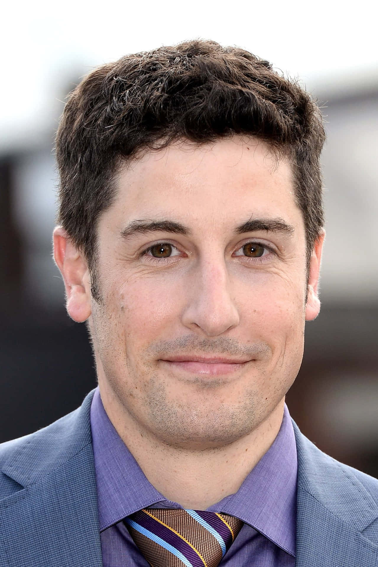 A Portrait Shot Of Jason Biggs At An Event Background